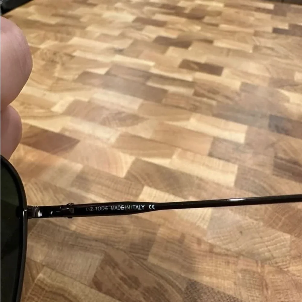 Tod's Black Frame Sunglasses with Dark Green Lenses